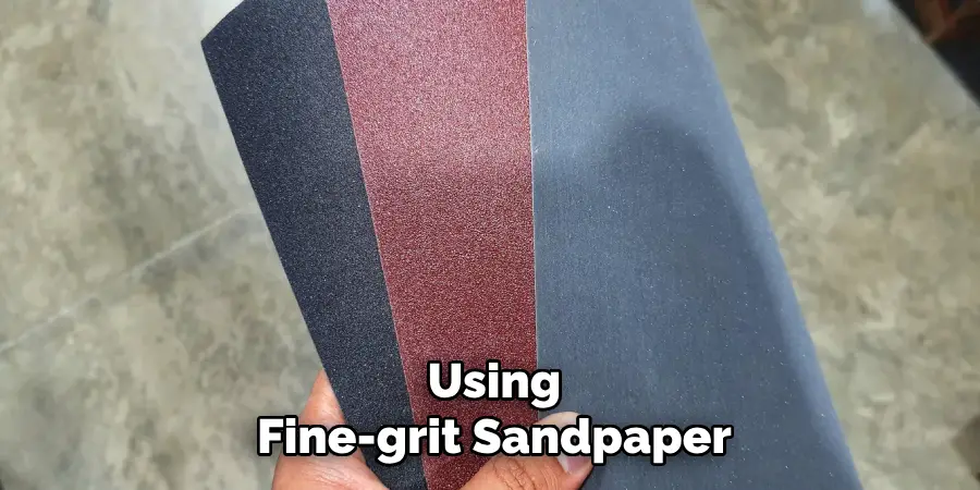 Using
Fine-grit Sandpaper