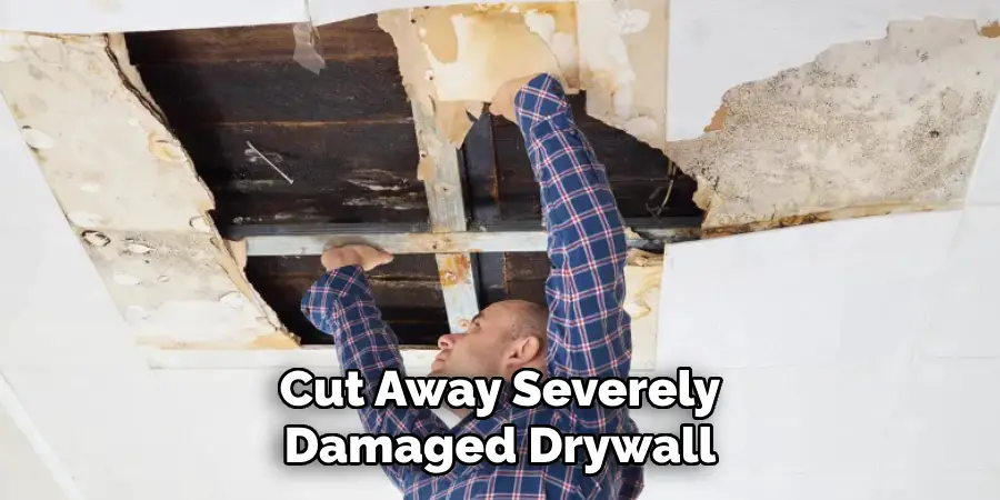 Cut Away Severely Damaged Drywall