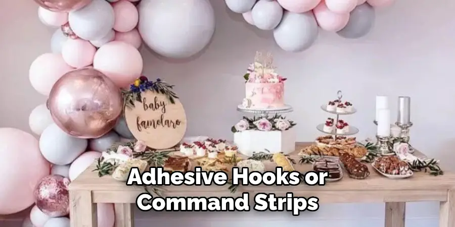 Adhesive Hooks or Command Strips