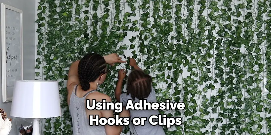 Using Adhesive Hooks or Clips