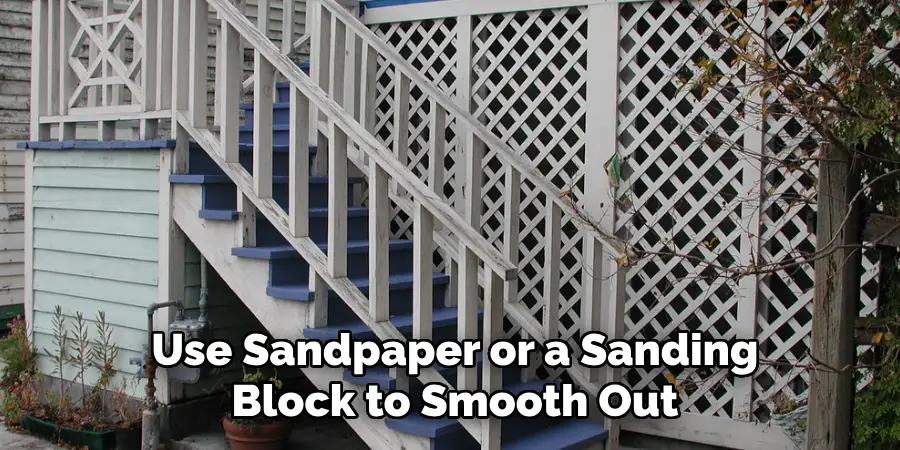 Use Sandpaper or a Sanding Block to Smooth Out