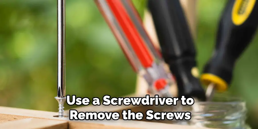Use a Screwdriver to
Remove the Screws