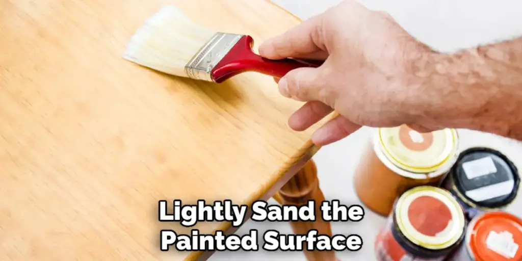 Lightly Sand the
Painted Surface