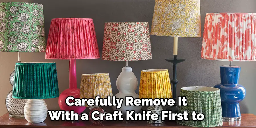 Carefully Remove It 
With a Craft Knife First to 
