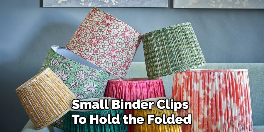 Small Binder Clips 
To Hold the Folded