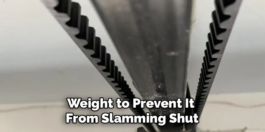 Weight to Prevent It 
From Slamming Shut