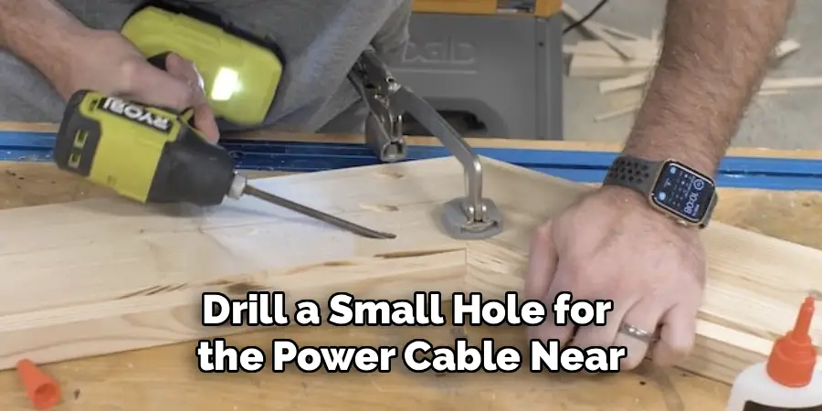 Drill a Small Hole for 
the Power Cable Near