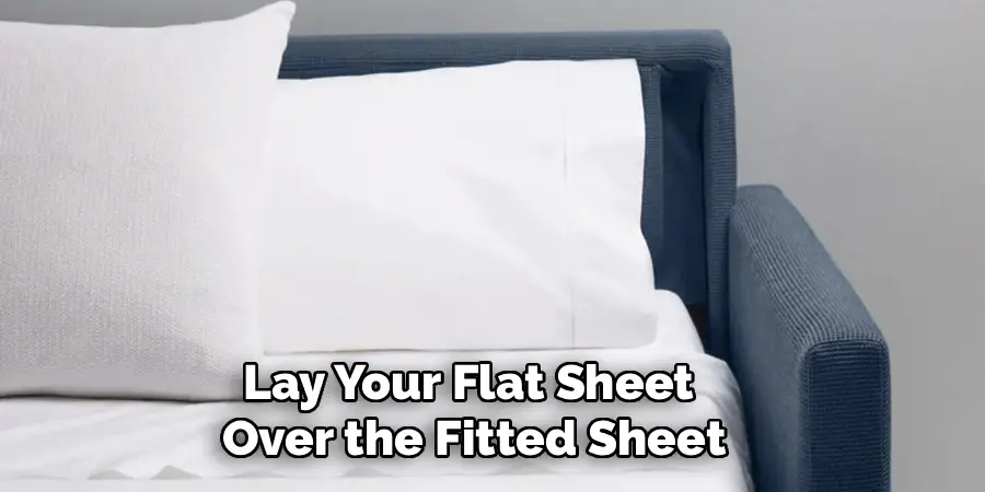 Lay Your Flat Sheet
Over the Fitted Sheet