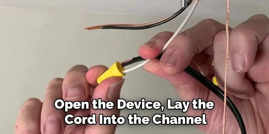 Open the Device, Lay the
Cord Into the Channel