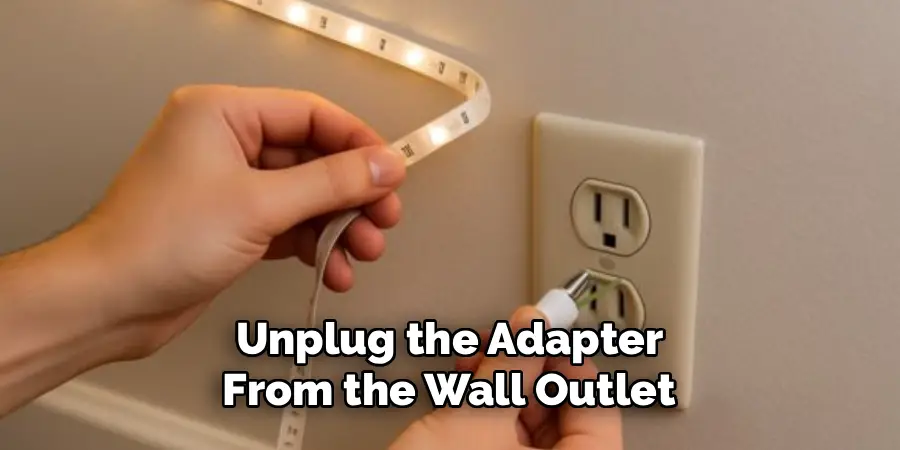 Unplug the Adapter 
From the Wall Outlet 