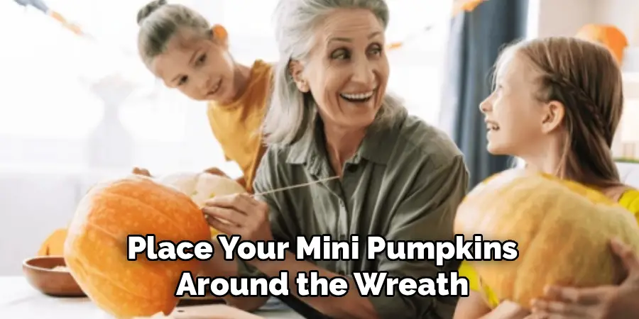 Place Your Mini Pumpkins
Around the Wreath