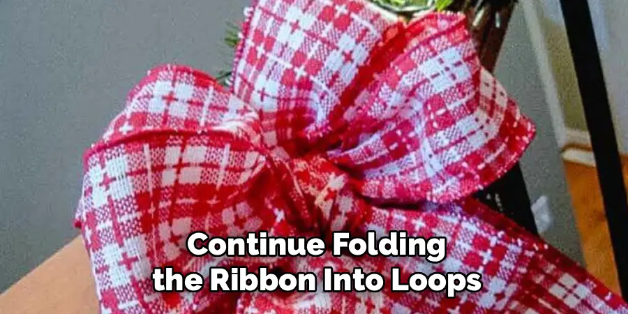Continue Folding
the Ribbon Into Loops